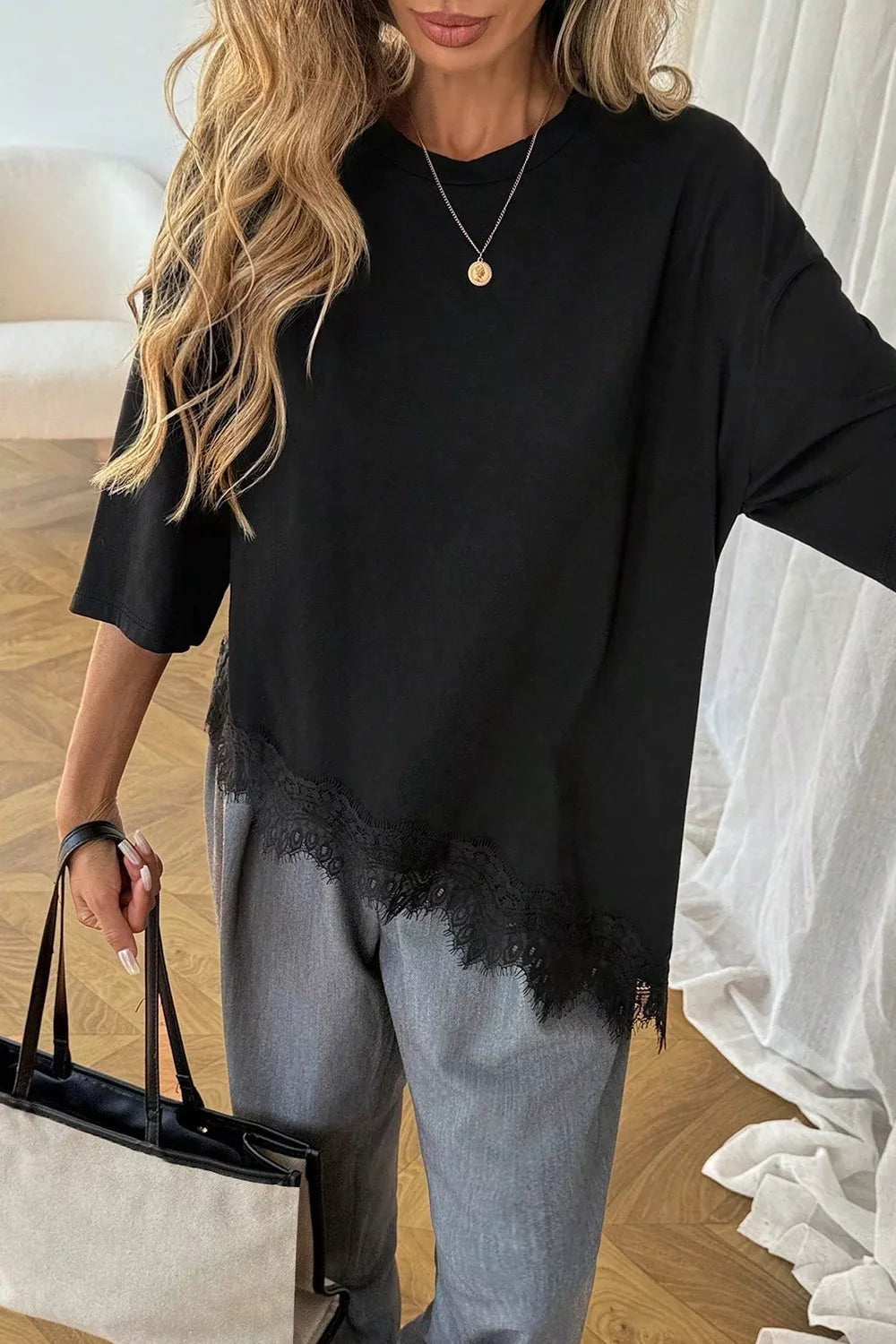Back view of lace asymmetrical hem round neck t-shirt