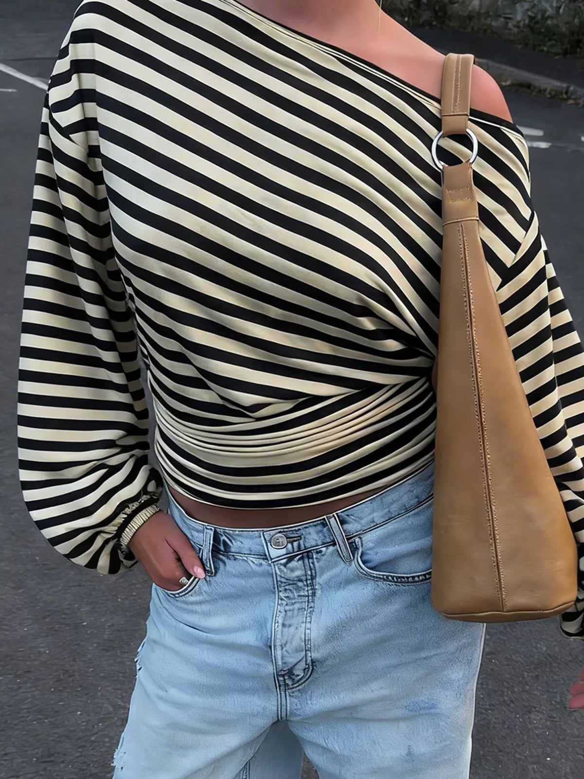 One shoulder striped t-shirt showing asymmetric neckline detail
