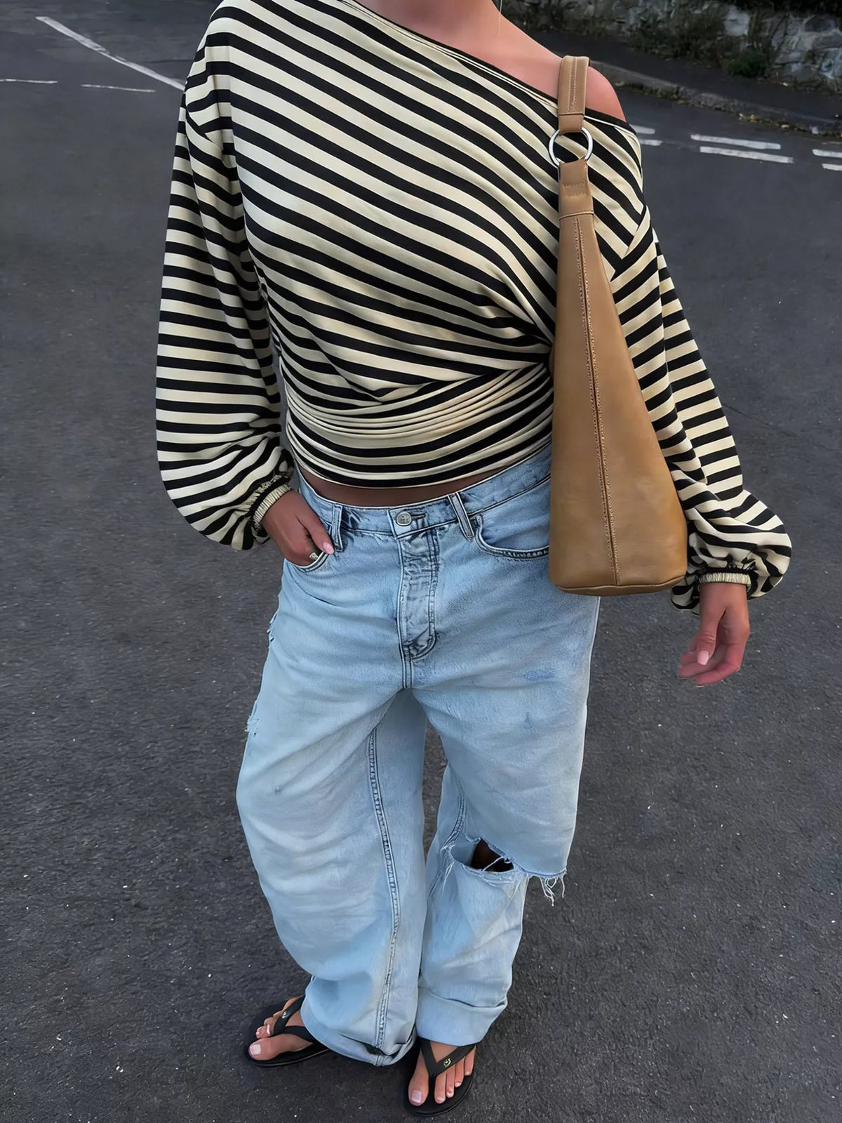 Back view of one shoulder striped long sleeve t-shirt