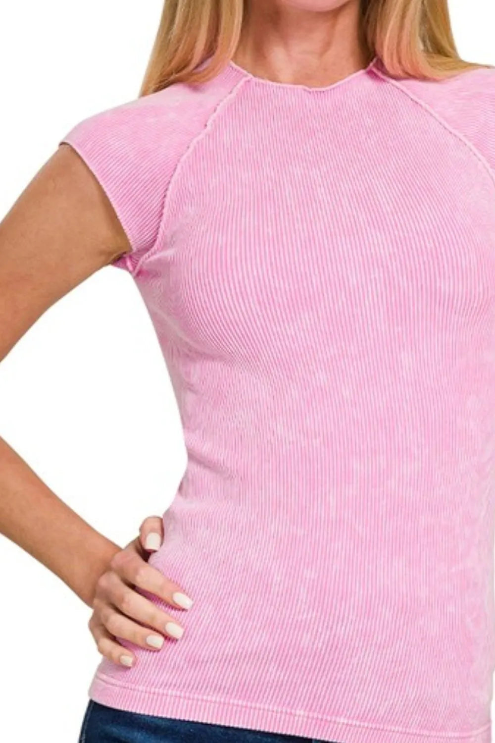 Model wearing candy pink stone washed ribbed sleeveless top